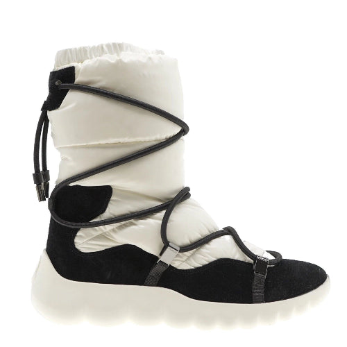 White and black winter boot with strap design on a white background