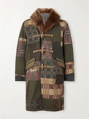 Patchwork coat with brown fur collar on a white background