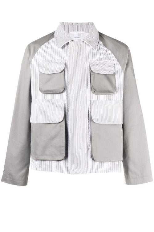 Gray and white jacket with patch pockets on a white background