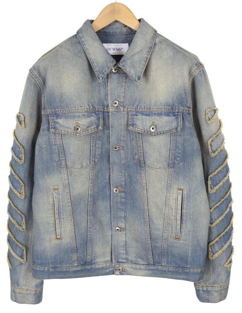 Denim jacket with decorative elements on a white background