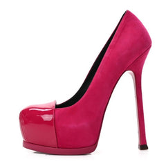 A single bright pink patent leather high-heeled pump with a platform sole and slim stiletto heel, shown against a plain white background.