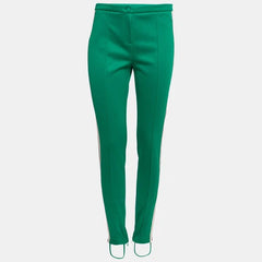 Green pants on a light gray background