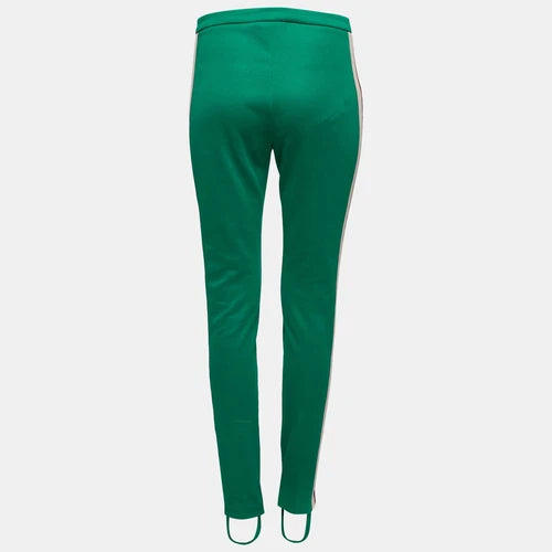 Green pants with white stripes on a light gray background
