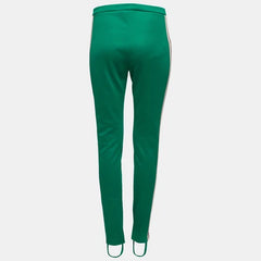 Green pants with white stripes on a light gray background