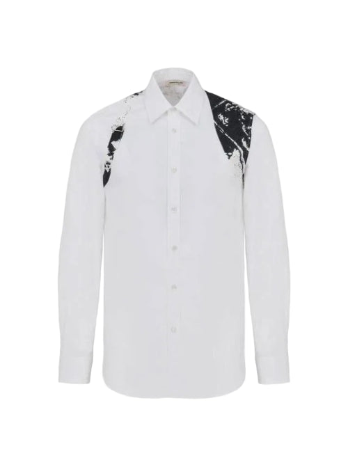 A white long-sleeve button-up shirt with black and white marble-patterned shoulder panels, shown against a plain white background.