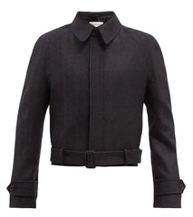 A black cropped jacket with a pointed collar and long sleeves, shown against a plain white background.
