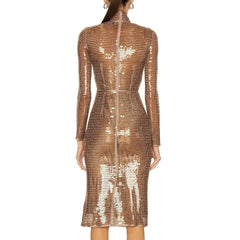 Gold sequin dress worn by a model on a white background