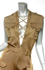 Tan vest with lacing and multiple pockets on a mannequin against a white background