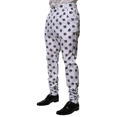 White pants with black pattern worn by a person on a white background