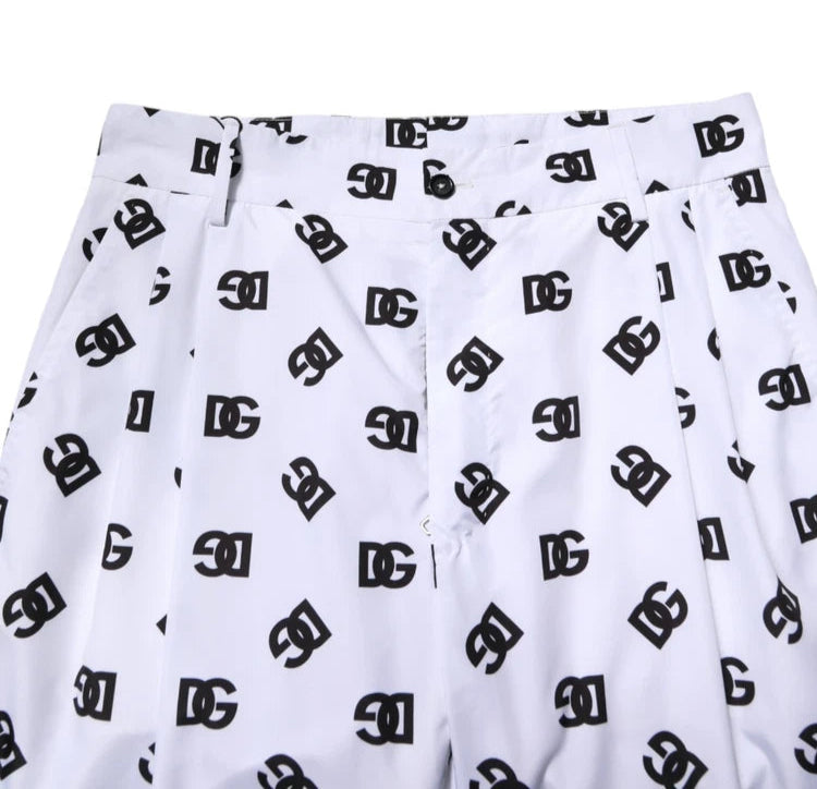 White shorts with black geometric pattern on a white background