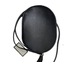 Black textured handbag on a light gray background