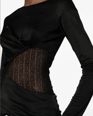 Black long-sleeve top with a textured brown panel on a white background