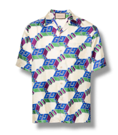 Colorful geometric patterned shirt on a white background