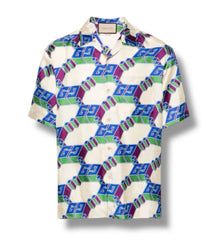 Colorful geometric patterned shirt on a white background
