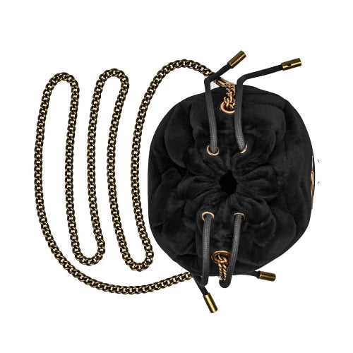 Black scrunchie with gold chain on a white background