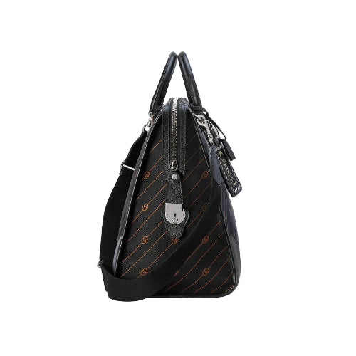 Black handbag with striped pattern on a light gray background