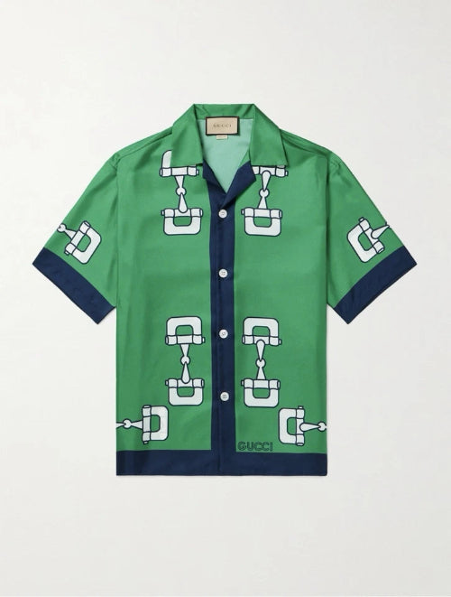 Green shirt with white pattern on a light gray background