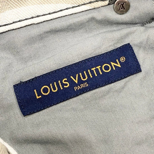 Louis Vuitton label on a gray fabric background