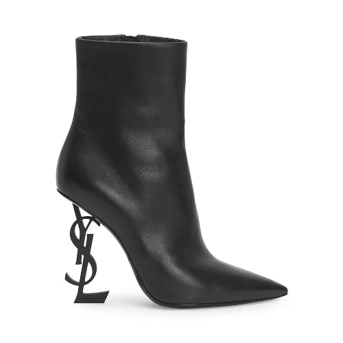 Black high-heeled ankle boot with a distinctive heel design on a white background