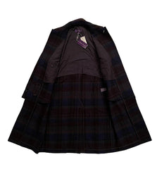 Plaid coat with tags on a beige background
