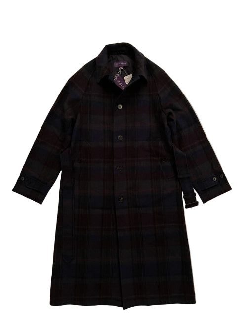 Plaid coat on a beige background