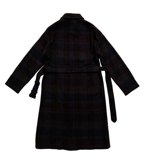 Plaid robe on a beige background