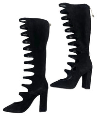 Black high-heeled knee-high boots with unique spiral design on a light gray background