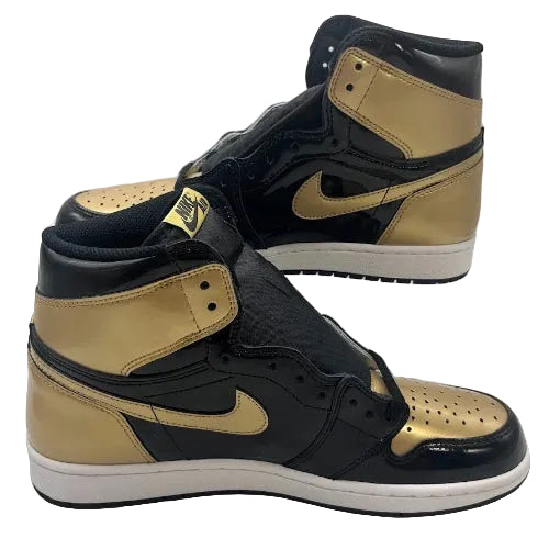 High-top sneakers with gold and black design on a white background