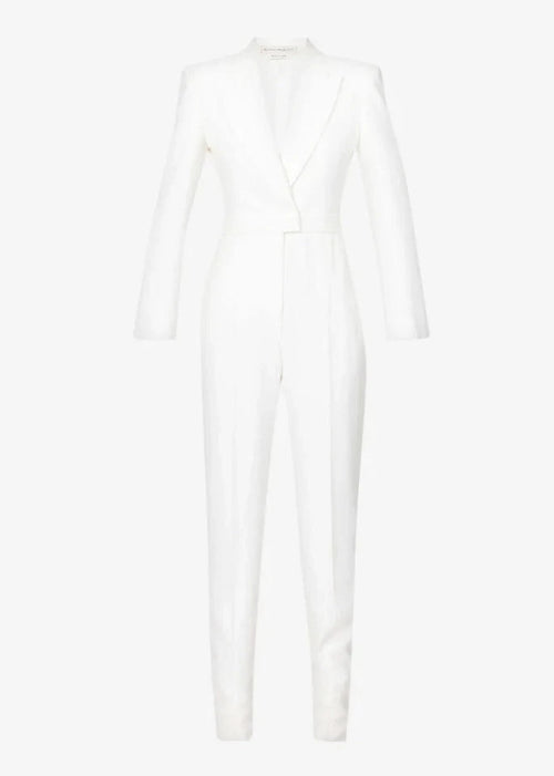 White suit jacket and pants on a white background