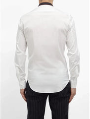 White dress shirt with long sleeves and black pinstripe pants on a white background