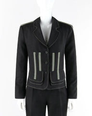 A black leather jacket with silver-toned vertical zipper accents on the front, displayed on a headless mannequin against a plain white background.