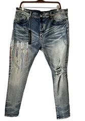 Light wash blue denim jeans with distressed details and fading, hanging on a black hanger against a white background.