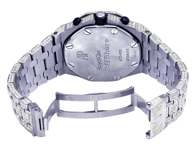 Silver watch with a detailed face on a white background