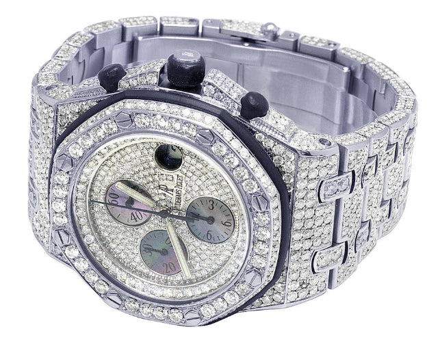 Luxury watch with diamond-studded case on a white background