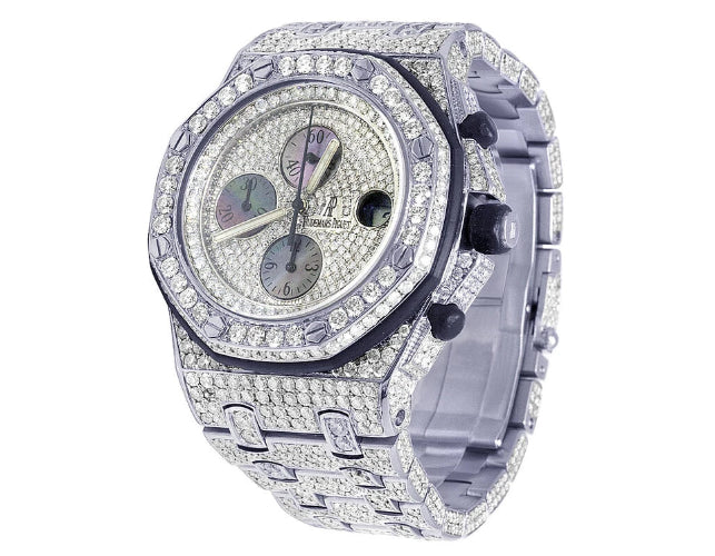 Luxury diamond-encrusted watch on a white background