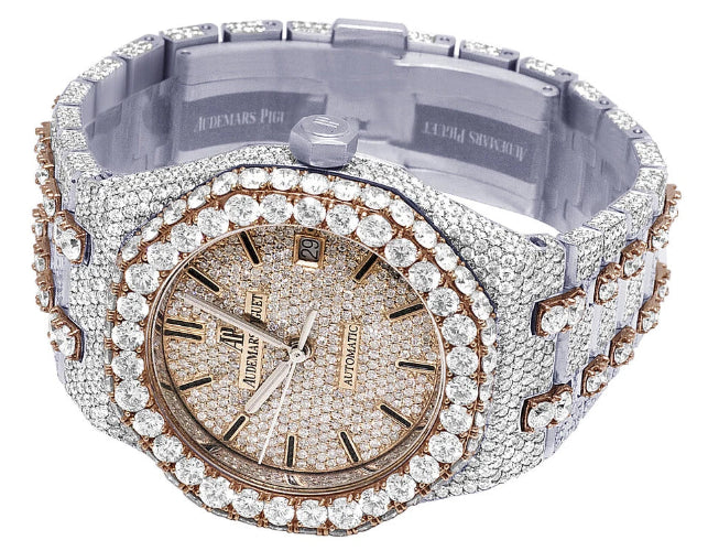 Luxury watch with diamond-studded band on a white background