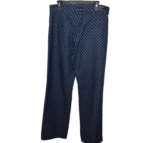 Dark blue pants with white polka dots on a light gray background