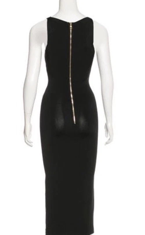 Black dress with a zipper detail on a mannequin against a white background