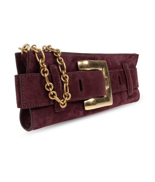 A dark burgundy velvet clutch bag with a gold-tone chain strap and a prominent gold rectangular buckle, shown against a plain white background.