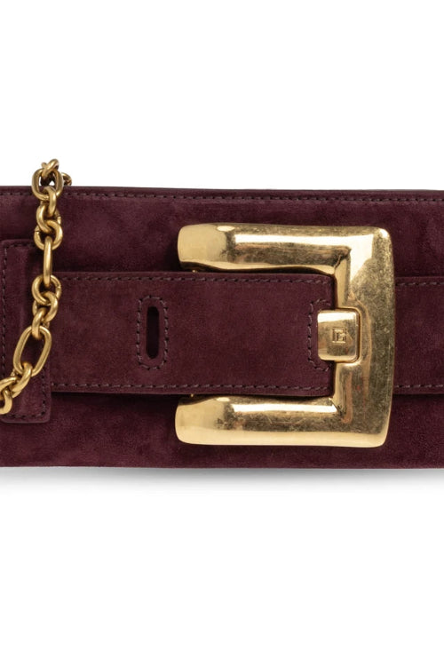 A close-up of a dark burgundy leather belt with a gold-tone buckle and a matching gold chain link, shown against a white background.