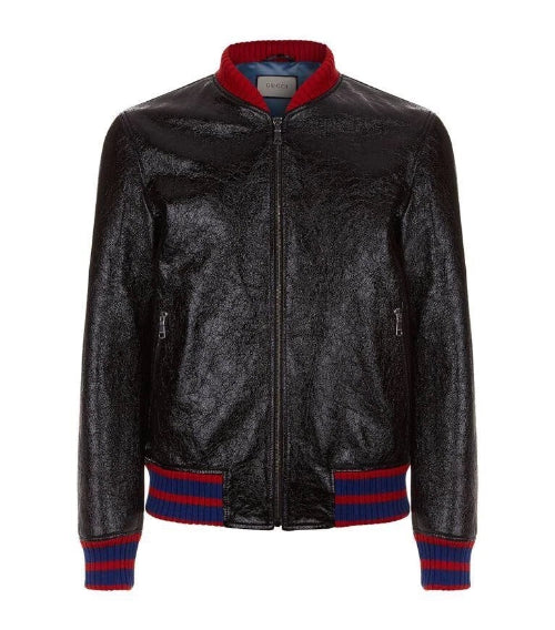 Black leather jacket with red and blue accents on a white background