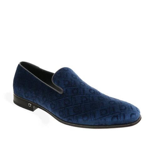 A single men's slip-on loafer in deep navy blue velvet, shown from a side angle against a plain white background.