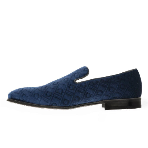 A single dark blue suede loafer shown from a side profile view against a plain white background.