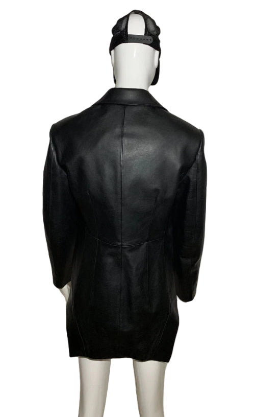 Black leather jacket on a mannequin against a plain background