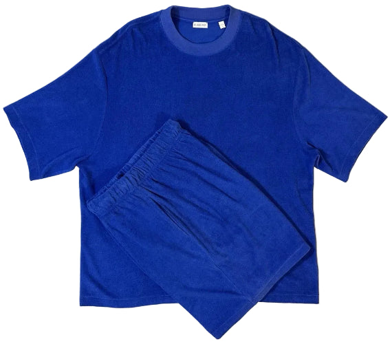 Blue t-shirt and shorts set on a light gray background