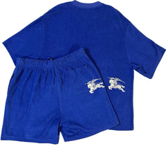 Blue t-shirt and shorts set with a logo on a beige background