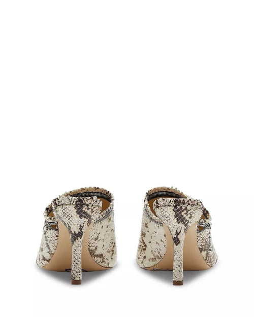 Pair of high-heeled shoes with snake print on a white background