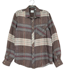 A long-sleeve plaid button-up shirt in brown, beige, and white, hanging on a hanger against a white background.
