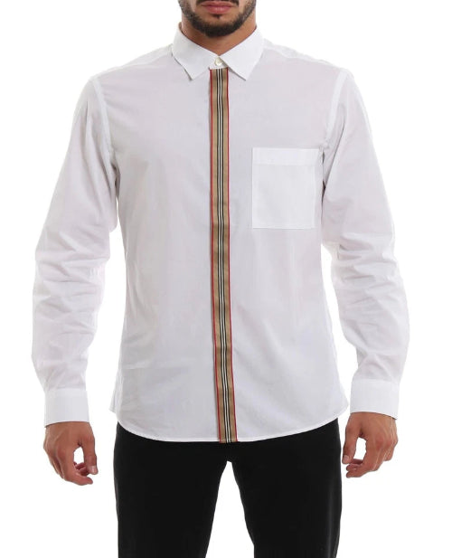 A man wearing a white long-sleeve button-down shirt with a brown and beige striped necktie, paired with black pants.