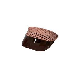 A Dior visor sunglasses with a dusty pink woven patterned headband and a dark brown tinted lens, presented inside its white Dior box.